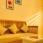 Warm-lit cottage interiors with rustic wooden design at the best stays in Ooty.