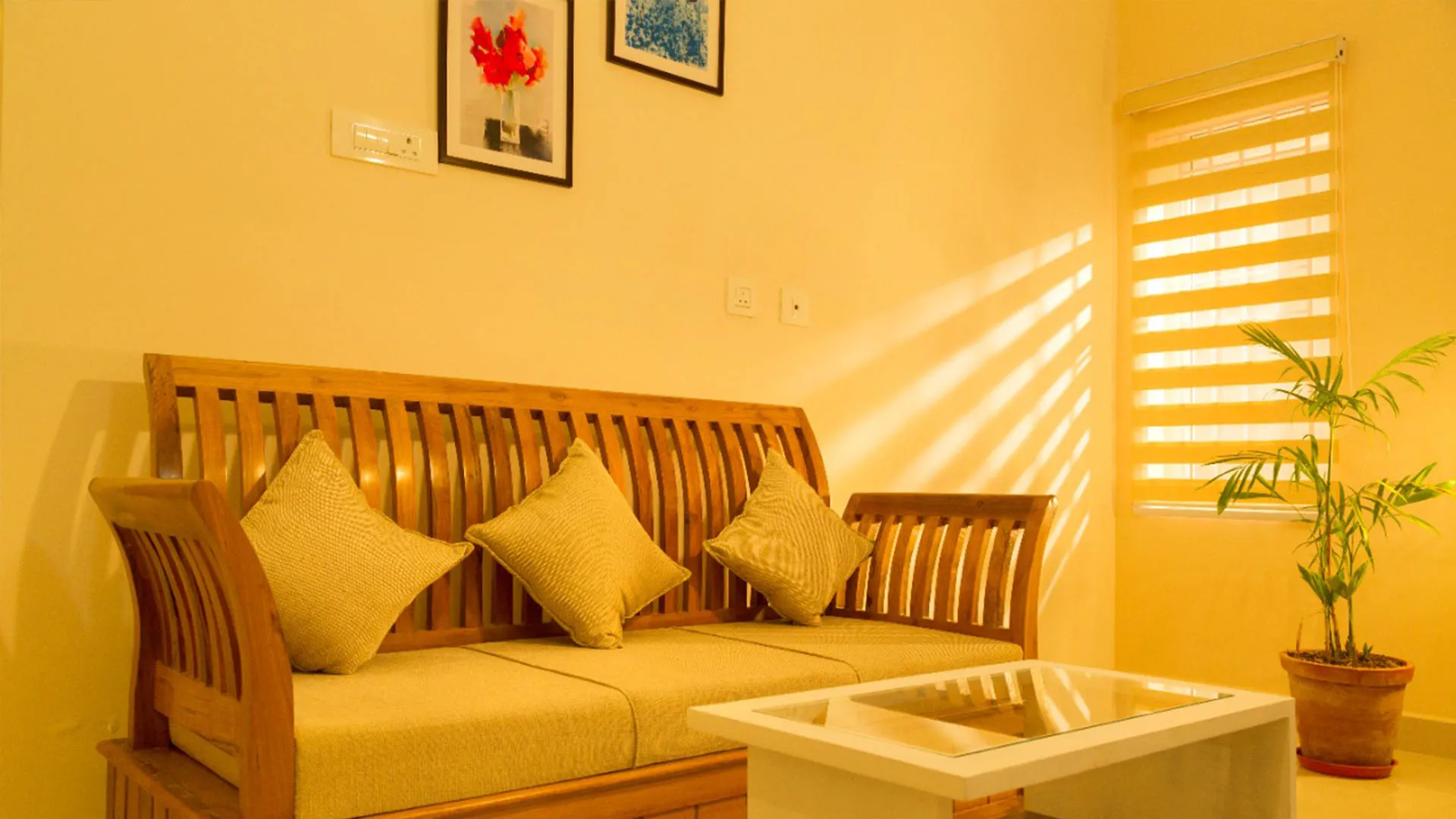 Warm-lit cottage interiors with rustic wooden design at the best stays in Ooty.
