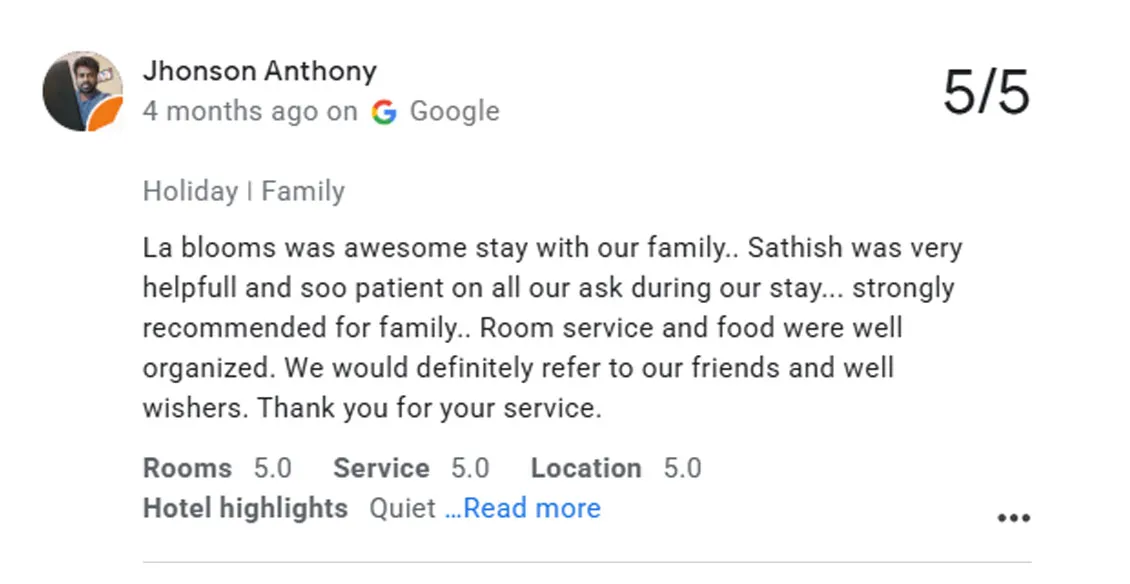 Family sharing a joyful review after their nature holiday at the stays in Ooty.
