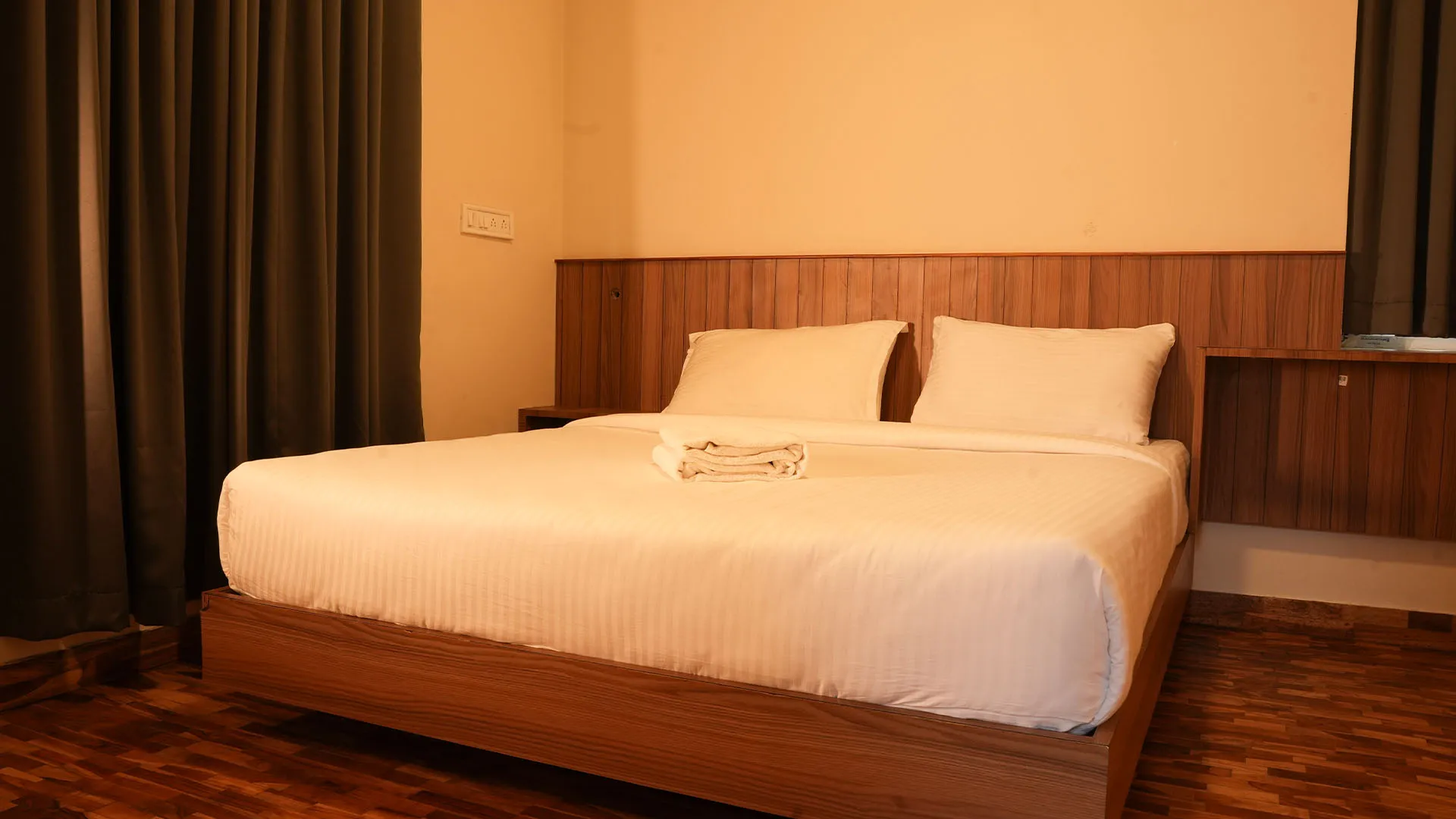 Sunset view from a cottage deck overlooking the Ooty valley at the best stays in Ooty.